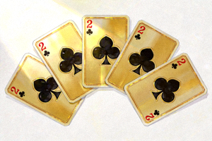 五张梅花组成的金花牌型示例图，分别是梅花2、梅花7、梅花J